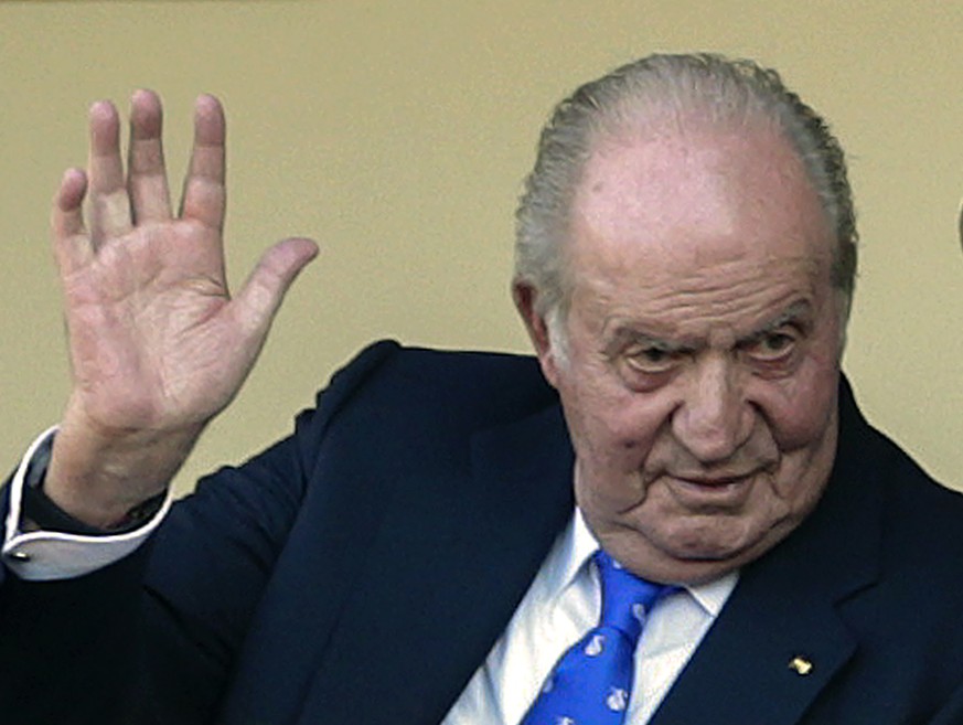 FILE - In this file photo dated Sunday, June 2, 2019, Spain&#039;s former King Juan Carlos waves at the bullring in Aranjuez, Spain. The royal family