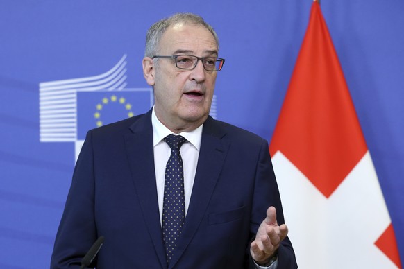 Swiss President Guy Parmelin speaks during a media conference at EU headquarters in Brussels, Friday, April 23, 2021. (Francois Walschaerts, Pool via AP)