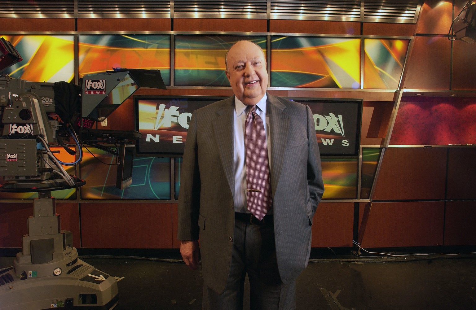 FILE - In this Sept. 29, 2006 file photo, Fox News CEO Roger Ailes poses at Fox News studio in New York. At age 76, Ailes has been vanquished from Fox News Channel, which he masterminded almost 20 yea ...