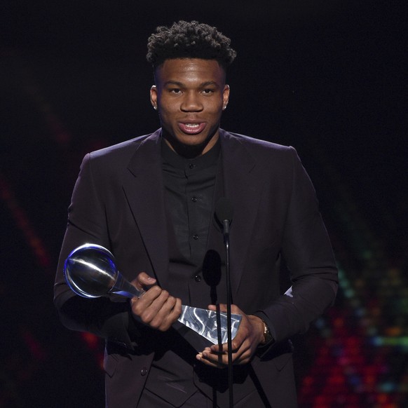 NBA player Giannis Antetokounmpo, of the Milwaukee Bucks, accepts the award for best male athlete at the ESPY Awards on Wednesday, July 10, 2019, at the Microsoft Theater in Los Angeles. (Photo by Chr ...