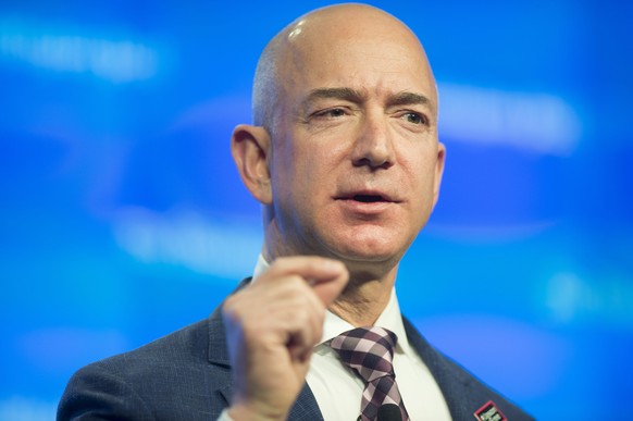 epa05446910 (FILE) A file photograph showing owner of the Washington Post and founder of Amazon, Jeff Bezos, delivering remarks at an event celebrating the new location of the Washington Post in Washi ...