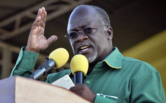 FILE - In this Friday, Oct. 23, 2015 file photo, President John Magufuli gestures during an election rally in Dar es Salaam, Tanzania. President John Magufuli of Tanzania, a prominent COVID-19 skeptic ...
