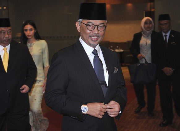 FILE- In this Jan. 11, 2019, file photo, Pahang state Crown Prince Tengku Abdullah arrives for a private event at a hotel in Kuala Lumpur. King Sultan Muhammad V shocked the nation by announcing his a ...