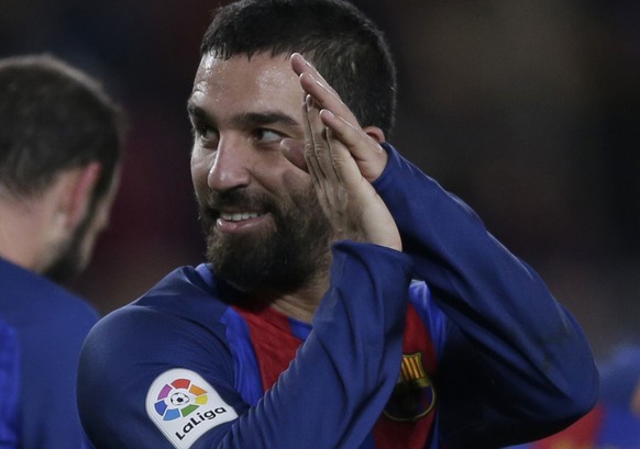 FC Barcelona&#039;s Arda Turan reacts after scoring a goal against Hercules during their Copa del Rey, Spain&#039;s King&#039;s Cup soccer match at the Camp Nou in Barcelona, Spain, Wednesday, Dec. 21 ...
