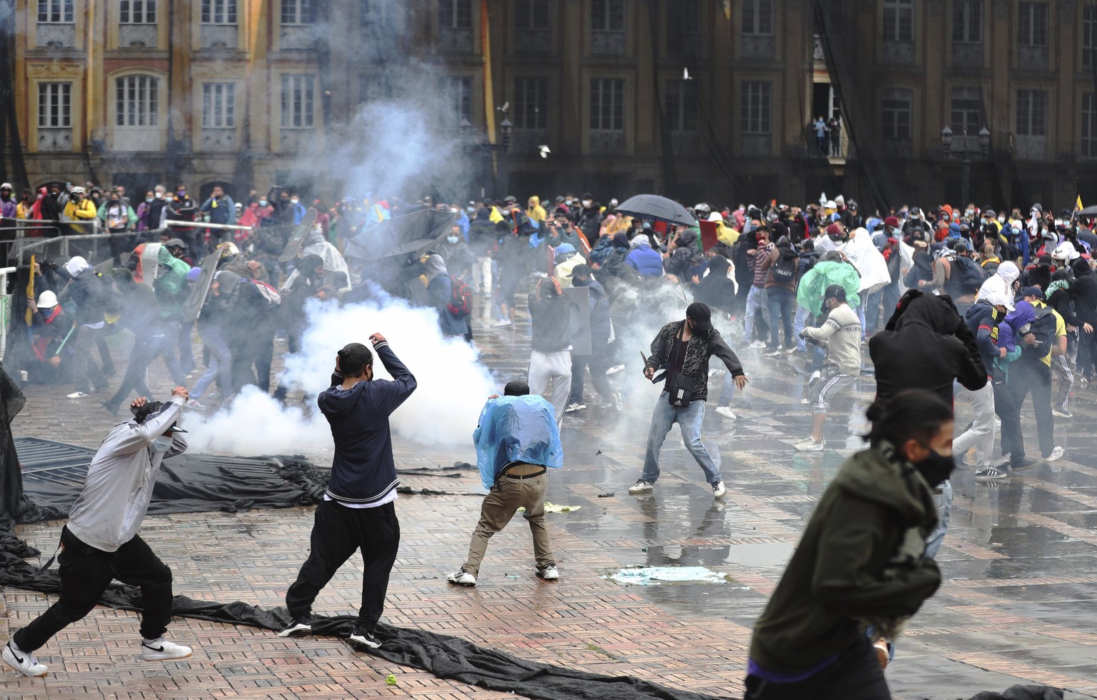 Anti-government protesters clash with police in Bogota, Colombia, Wednesday, May 5, 2021. The protests that began last week over a tax reform proposal continue despite President Ivan Duque&#039;s with ...