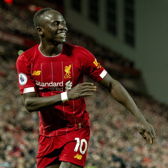 epa08099032 Liverpool&#039;s Sadio Mane celebrates after scoring the second goal during the English Premier League soccer match between Liverpool and Sheffield United at Anfield, Liverpool, Britain, 0 ...
