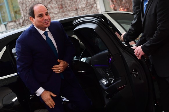 epa08010729 President of Egypt and Chairperson of the African Union Abdel Fattah al-Sisi (L) arrives for a meeting with German Chancellor Angela Merkel (not in the picture) at the Chancellery for a bi ...