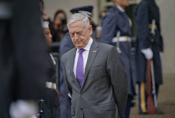 FILE - In this Nov. 9, 2018, file photo, Defense Secretary Jim Mattis waits outside the Pentagon. President Donald Trump says Mattis will be retiring at the end of February 2019 and that a new secreta ...