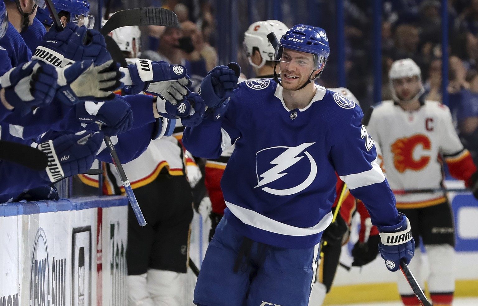 Tampa Bay Lightning&#039;s Brayden Point celebrates his goal against the Calgary Flames during the first period of an NHL hockey game Tuesday, Feb. 12, 2019, in Tampa, Fla. (AP Photo/Mike Carlson)