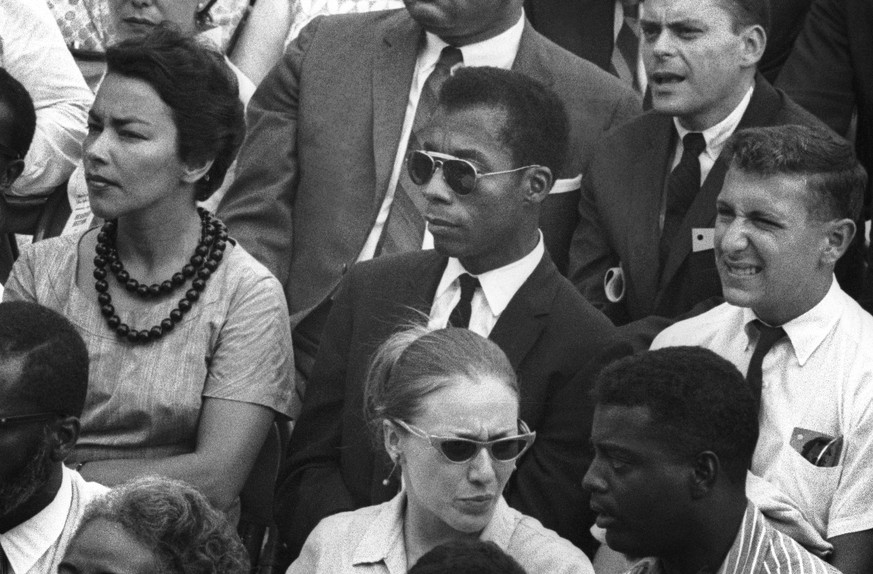This image released by Magnolia Pictures shows James Baldwin, center, in &quot;I Am Not Your Negro.&quot; (Dan Budnik/Magnolia Pictures via AP)