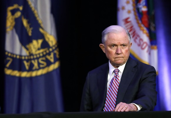 Attorney General Jeff Sessions waits to speak at the Eighth Judicial District Conference, Friday, Aug. 17, 2018, in Des Moines, Iowa. (AP Photo/Charlie Neibergall)