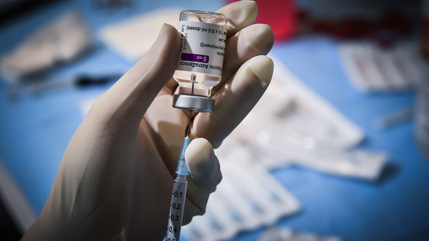epa09061252 Health personnel prepares a dose of the Astrazeneca vaccine against COVID-19, in Milan, Italy, 08 March 2021. Italian Health Minister Roberto Speranza has pledged that everyone in Italy wh ...