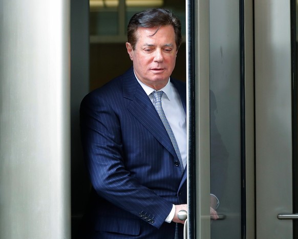 FILE - In this Feb. 14, 2018, file photo, Paul Manafort, President Donald Trump&#039;s former campaign chairman, leaves the federal courthouse in Washington. New documents reveal that Special Counsel  ...