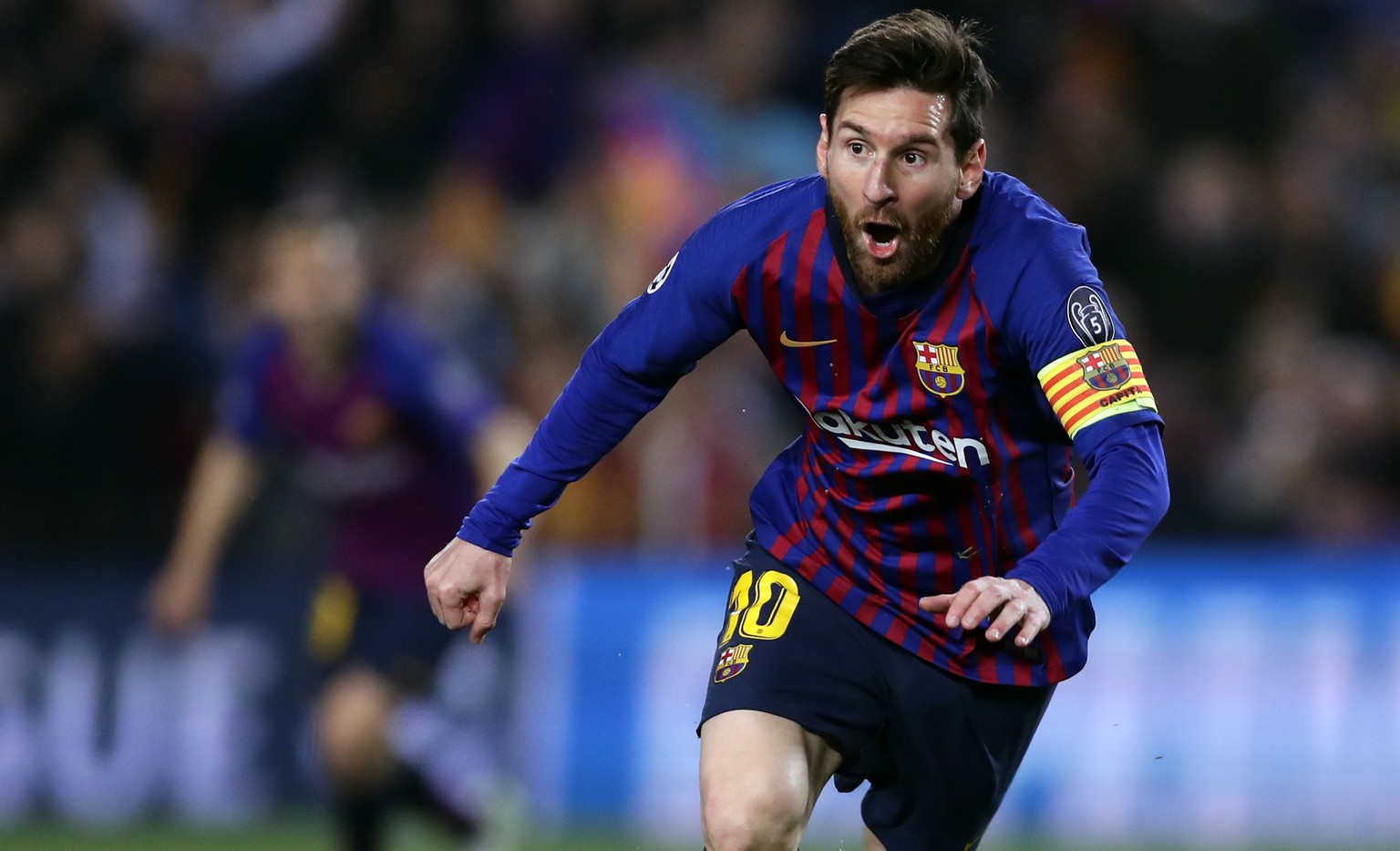 Barcelona forward Lionel Messi celebrates after scoring his side&#039;s second goal during the Champions League quarterfinal, second leg, soccer match between FC Barcelona and Manchester United at the ...