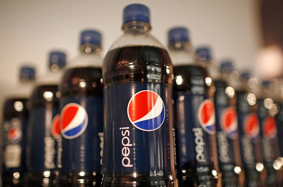 Bottles of Pepsi cola are seen in a display at PepsiCo&#039;s 2010 Investor Meeting event in this file photo taken New York, March 22, 2010. PepsiCo Inc is taking over league sponsorship rights for th ...