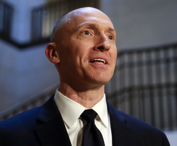 In this Nov. 2, 2017, photo, Carter Page, a foreign policy adviser to Donald Trump&#039;s 2016 presidential campaign, speaks with reporters following a day of questions from the House Intelligence Com ...