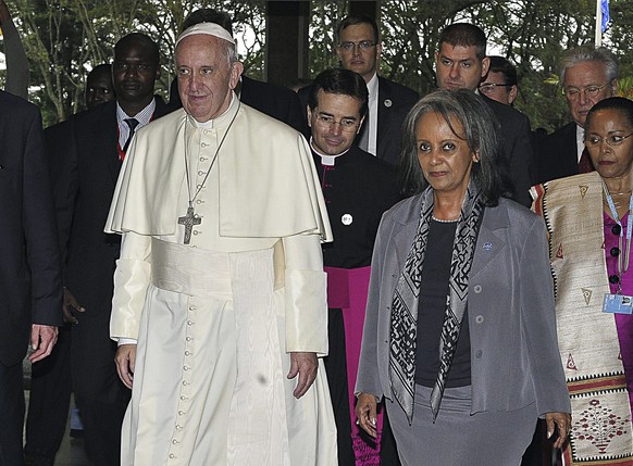 FILE - In this Thursday, Nov. 26, 2015 file photo, Pope Francis walks next to then Director-General of the United Nations Office at Nairobi (UNON) Sahle-Work Zewde, right, upon his arrival there in Na ...