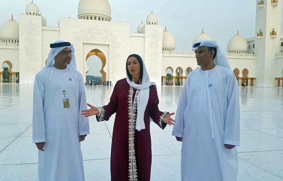 In this Tuesday, Oct. 29, 2018 photo, released by the Israeli Ministry of Culture and Sport, Israeli Minister of Culture and Sport Miri Regev, center, visits Sheikh Zayed Grand Mosque, in Abu Dhabi, U ...