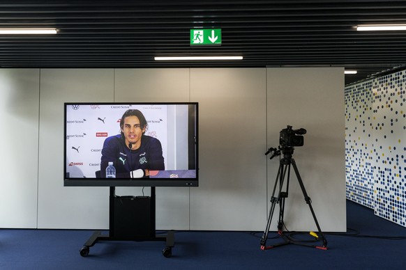 Switzerland&#039;s goalkeeper Yann Sommer is shown on a screen during a press conference one day before the UEFA Nations League soccer match between Switzerland and Ukraine at the Swissporarena in Luc ...