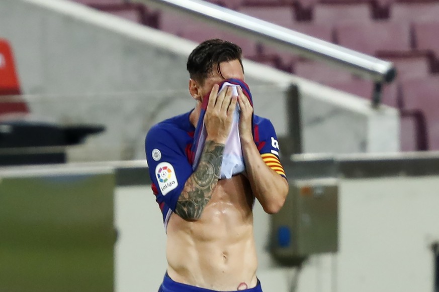 Barcelona&#039;s Lionel Messi reacts during a Spanish La Liga soccer match between Barcelona and Osasuna at the Camp Nou stadium in Barcelona, Spain, Thursday, July 16, 2020. (AP Photo/Joan Monfort)