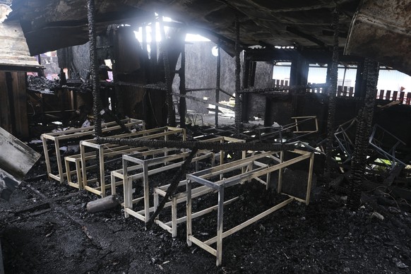 A burned installation which built for migrants, is seen on the northeastern Aegean island of Lesbos, Greece, Sunday, March 8, 2020. A fire broke out at a refugee center on Lesbos island, Greece&#039;s ...