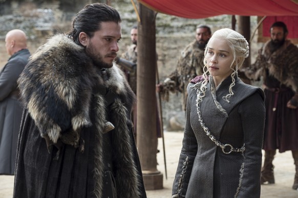 This image released by HBO shows Kit Harington, left, and Emilia Clarke on the season finale of &quot;Game of Thrones.&quot; The series set yet another audience record Sunday with its seventh-season f ...