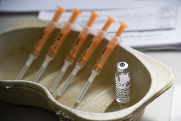 FILE - In this Sunday, March 21, 2021 file photo a vial and syringes of the AstraZeneca COVID-19 vaccine, at the Guru Nanak Gurdwara Sikh temple, in Luton, England. British-Swedish drugmaker AstraZene ...
