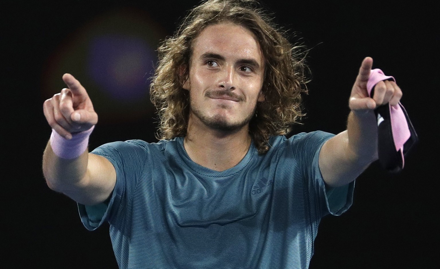 Greece&#039;s Stefanos Tsitsipas celebrates after defeating Switzerland&#039;s Roger Federer in their fourth round match at the Australian Open tennis championships in Melbourne, Australia, Sunday, Ja ...