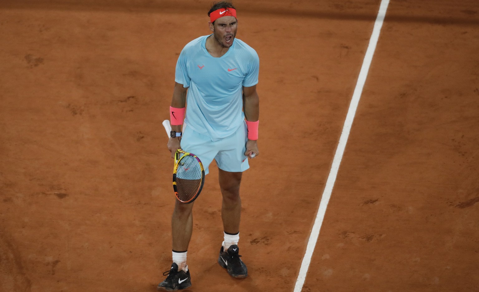 Spain&#039;s Rafael Nadal celebrates winning his quarterfinal match of the French Open tennis tournament against Italy&#039;s Jannik Sinner in three sets, 7-6 (7-4), 6-4, 6-1, at the Roland Garros sta ...