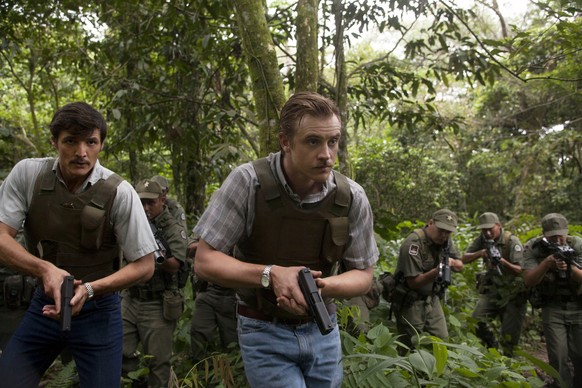 This undated production photo provided by Netflix, shows actors Pedro Pascal, left, as Javier Pena, and Boyd Holbrook as Steve Murphy in the Netflix Original Series &quot;Narcos.&quot; The series that ...