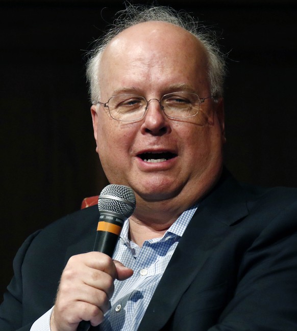 FILE- In this Aug. 18, 2018 file photo Republican strategist Karl Rove speaks during the Mississippi Book Festival in Jackson, Miss. Rove and a connected dark money group are raising money for a GOP c ...