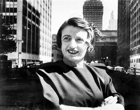 FILE - This 1962 file photo Ayn Rand, Russian-born American novelist, is photographed in New York with Grand Central Terminal in the background. A Rand novel written, temporary shelved and later publi ...