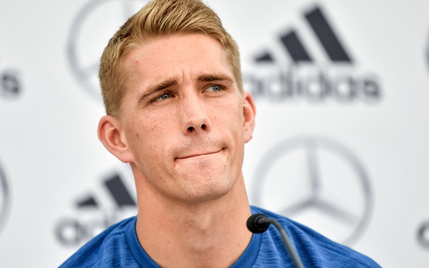 epa06762223 Germany player Nils Petersen speaks to the media during a press conference of the German national soccer team in Eppan, Italy, 25 May 2018. The German squad prepares for the upcoming FIFA  ...