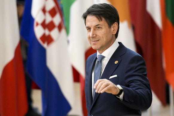 epa06847605 Italian Prime Minister Giuseppe Conte arrives for an European Council summit in Brussels, Belgium, 28 June 2018. EU countries&#039; leaders meet on 28 and 29 June for a summit to discuss m ...