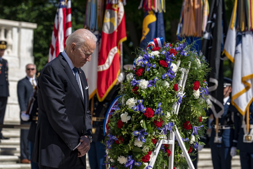 epa09239432 US President Joe Biden lays a wreath at the Tomb of the Unknown Solider at Arlington National Cemetery in Arlington, Virginia, USA, 31 May 2021. President Biden also delivered the remarks  ...