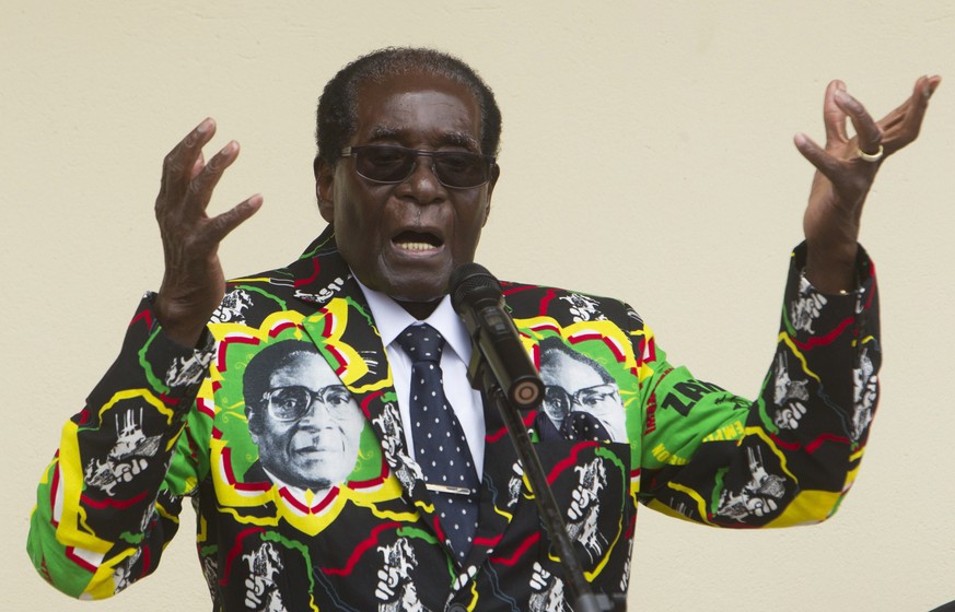 FILE - In this Saturday, Dec, 17, 2016 file photo, Zimbabwean President Robert Mugabe addresses people at an event before the closure of his party&#039;s 16th Annual Peoples Conference in Masvingo, so ...