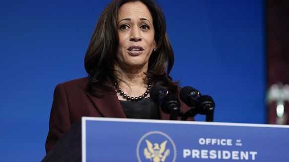 Vice President-elect Kamala Harris speaks as she and President-elect Joe Biden introduce their nominees and appointees to key national security and foreign policy posts at The Queen theater, Tuesday,  ...