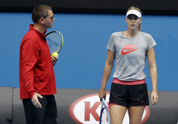 Russia&#039;s Maria Sharapova talks with her coach Sven Groeneveld, left, return during a practice session on Rod Laver Arena at the Australian Open tennis championship in Melbourne, Australia, Thursd ...