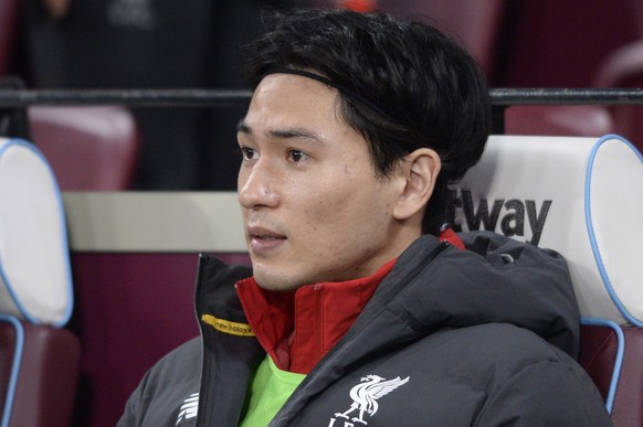 epa08176921 Takumi Minamino of Liverpool prior to the English Premier League soccer match between West Ham United and Liverpool FC held at the London Stadium in London, Britain, 29 January 2020. EPA/H ...