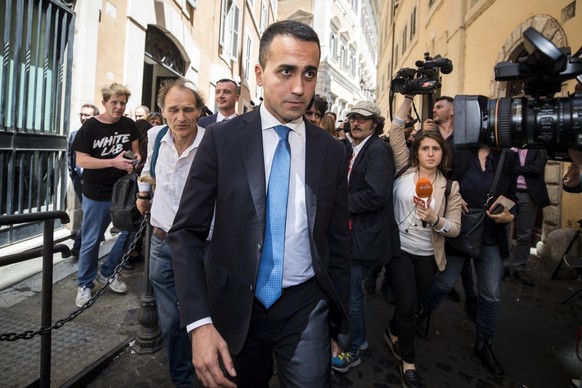 epa06762679 Five-Star Movement (M5S) leader Luigi Di Maio leaves Lower House in Rome, Italy, 25 May 2018. Premier designate Giuseppe Conte met the head of the 5-star Movement (M5S) Luigi Di Maio and t ...