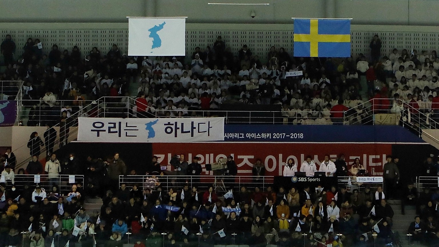 epa06495741 The Flag of Korean Peninsula is hanged instead South Korean national flag during the Women&#039;s Ice Hockey friendly match Korea vs Sweden at Seonhak International Ice Rink in Incheon, So ...