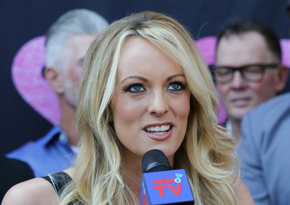 FILE - In this May 23, 2018 file photo Stormy Daniels, speaks during a ceremony for her receiving a City Proclamation and Key to the City in West Hollywood, Calif. A federal judge will consider Monday ...