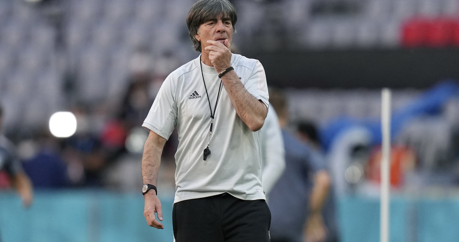 Germany&#039;s head coach Joachim Loew walks on the pitch during a team training session at Allianz Arena stadium in Munich, Monday, June 14, 2021 the day before the Euro 2020 soccer championship grou ...