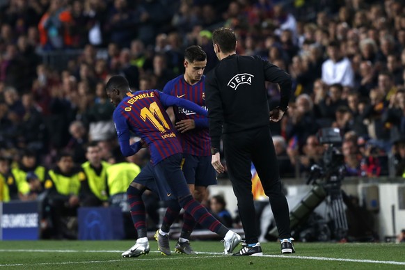 Barcelona forward Philippe Coutinho is substituted by Barcelona forward Ousmane Dembele during the Champions League quarterfinal, second leg, soccer match between FC Barcelona and Manchester United at ...