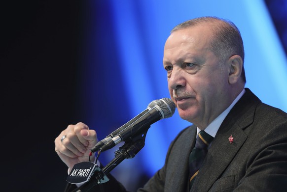 FILE - In this file photo dated Wednesday, March 24, 2021, Turkey&#039;s President Recep Tayyip Erdogan gestures as he delivers a speech during his ruling party&#039;s congress inside a packed sports  ...