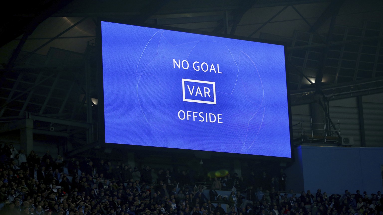 A big screen shows Manchester City&#039;s Raheem Sterling&#039;s goal was disallowed for offside against Manchester City&#039;s Sergio Aguero following a VAR review during the Champions League quarter ...