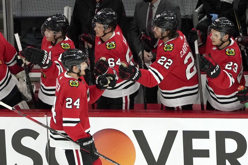 Chicago Blackhawks&#039; Pius Suter is congratulated for his goal during the first period of the team&#039;s NHL hockey game against the Nashville Predators on Wednesday, April 21, 2021, in Chicago. ( ...