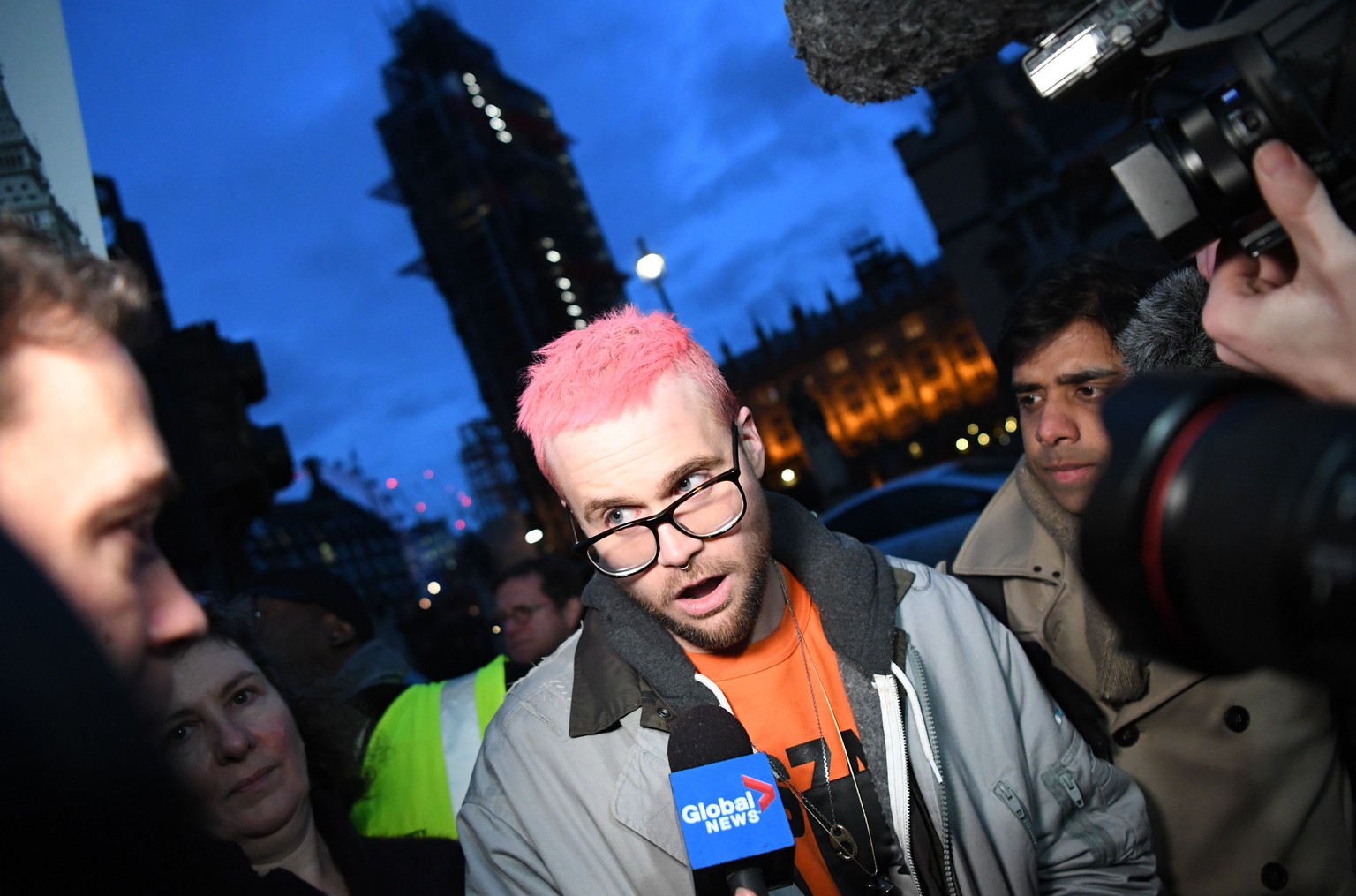 epa06636375 Cambridge Analytica whistleblower Chris Wylie (C) leaves a Fair Vote rally in London, Britain 29 March 2018. Cambridge Analytica is accused of using the personal data of 50 million Faceboo ...