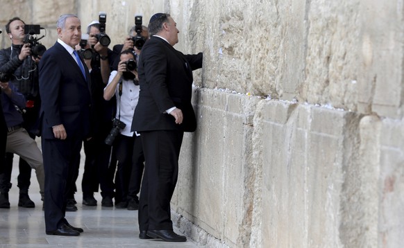 From left, Israeli Prime Minister Benjamin Netanyahu and U.S. Secretary of State Mike Pompeo visit the Western Wall in Jerusalem&#039;s Old City, Thursday, March 21, 2019. (Abir Sultan/Pool Image via  ...
