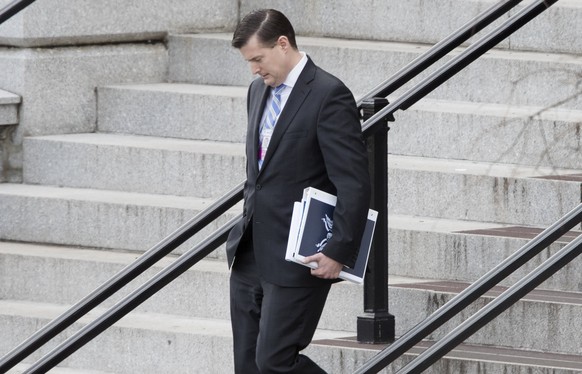 epa06504945 (FILE) - Trump transition team member Rob Porter walks outside the Eisenhower Executive Office Building following meetings, at the White House complex in Washington, DC, USA, 13 January 20 ...